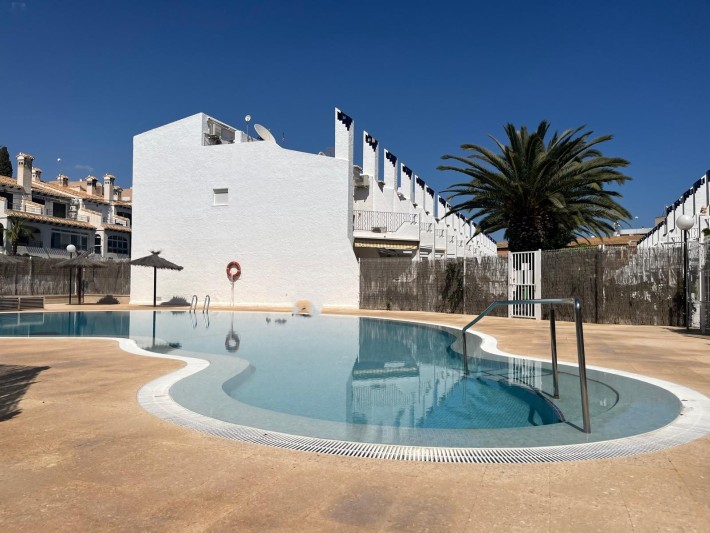 Terraced house on the beachside of Cabo Roig