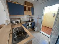 Terraced house in sunny location overlooking the community pool in La Florida
