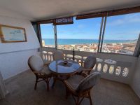 South-facing penthouse apartment - only 100m from the beach!